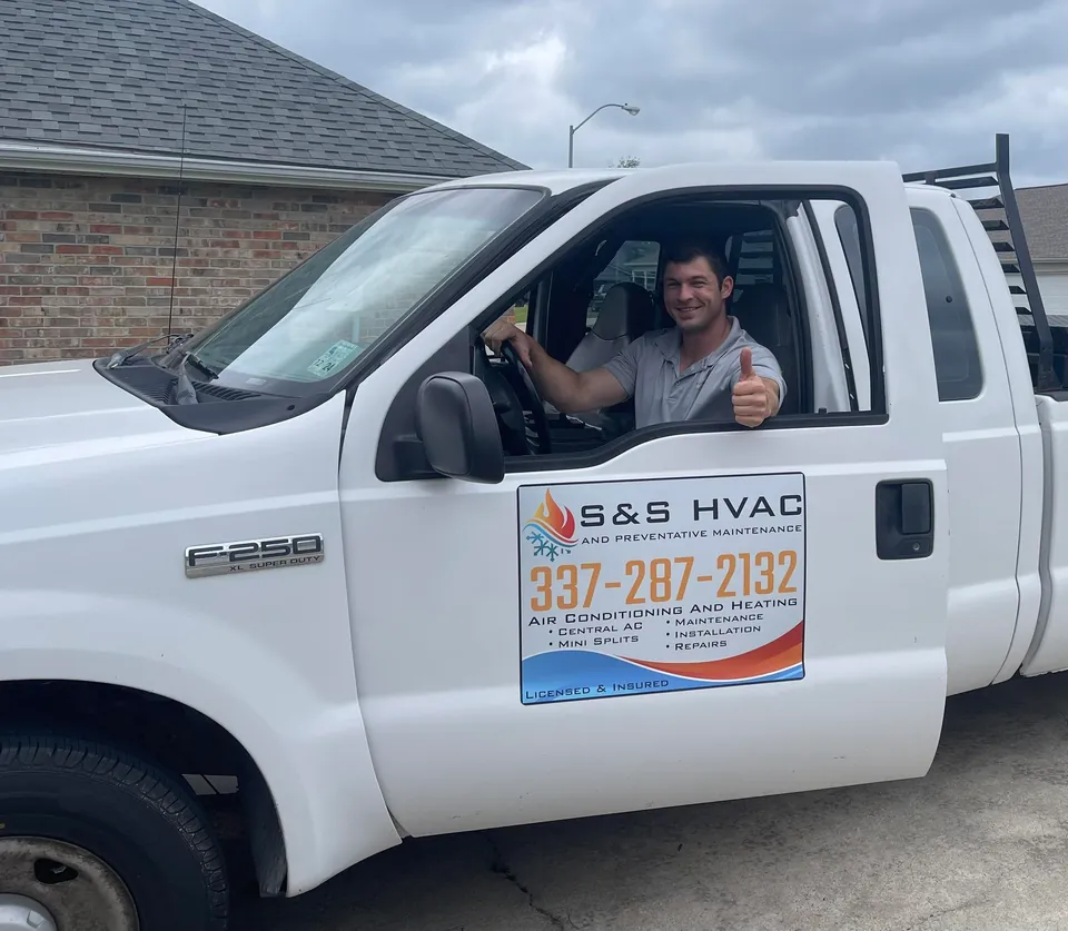 Andrew Stetz, co-owner of S&S HVAC, in the branded service truck